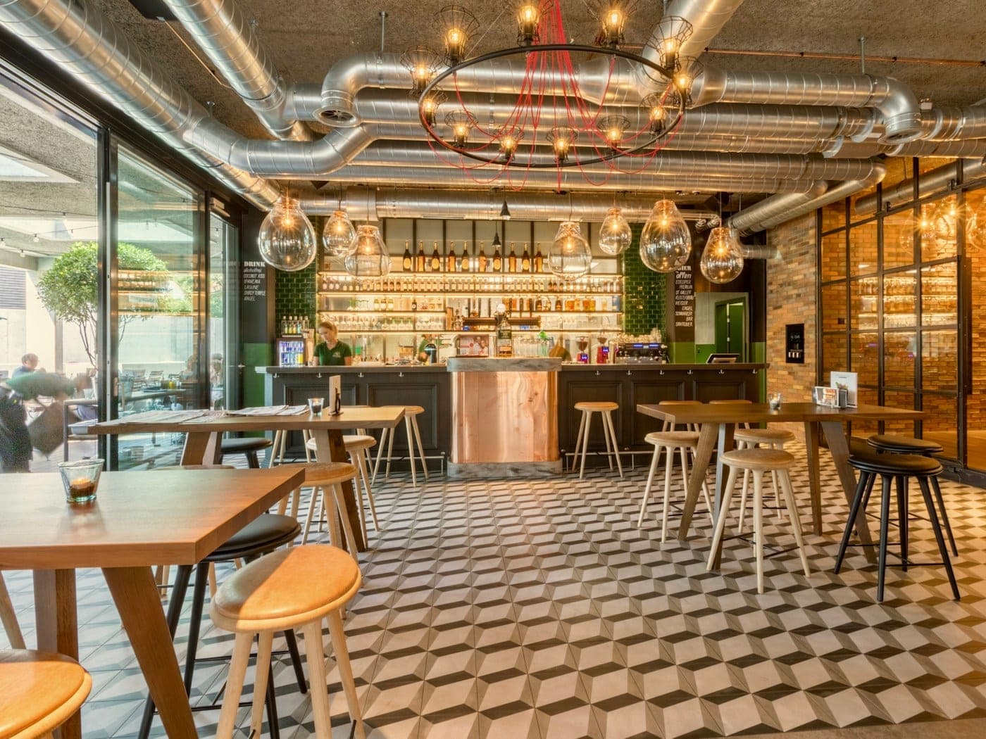 Guests seated along the open kitchen counter